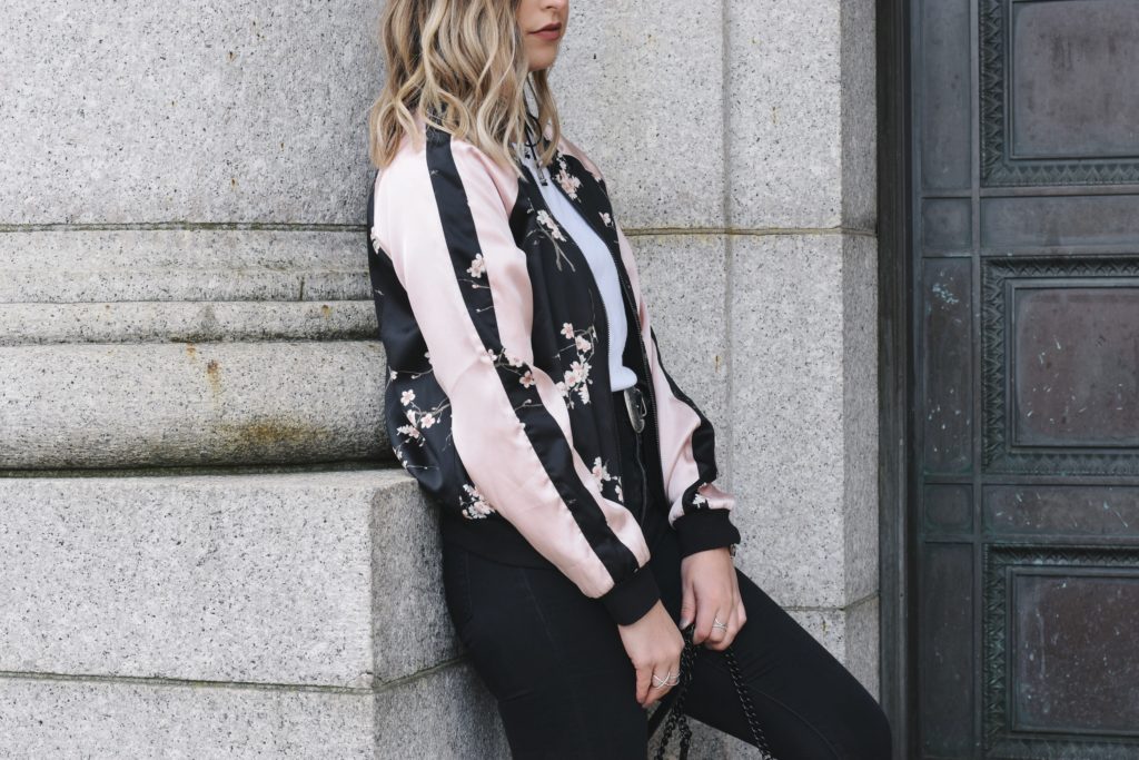 wearing a floral bomber jacket for fall