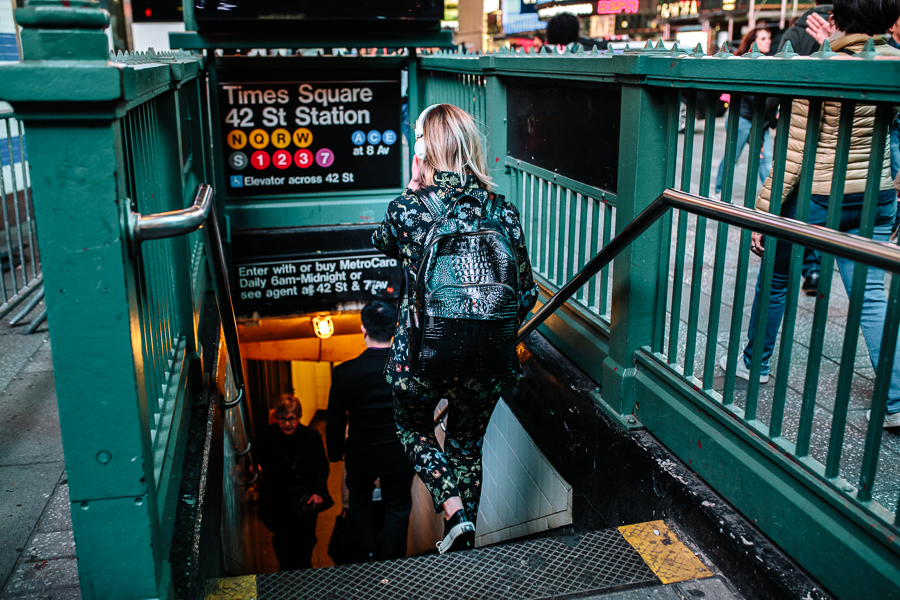 NYC Blogger, Times Square NYC, night time in Times Square, Yellow Taxi Cabs, H&M Coordinating set, Sudio headphones, Brahmin black leather backpack, commuting in NYC, lights in times square, night time in NYC, subway station, NYC subway, Times Square subway
